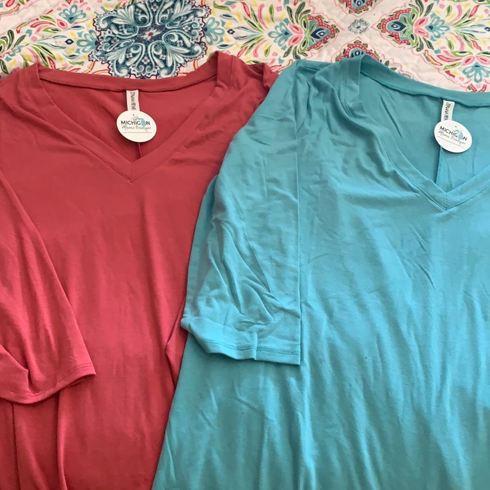 New from a boutique 3/4 length sleeve shirts